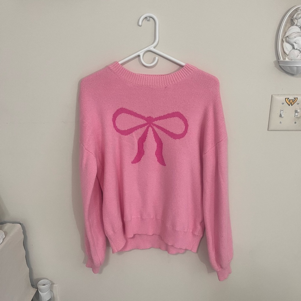 Pink Sweater with Bow Design